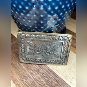 Western melt belt buckle with roses and hearts design